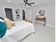 Spacious bedroom with a queen bed, walk-in closet and ceiling fan at 5252 Post Ln, Lakeland, FL 33809