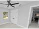 Bedroom with double doors leading to another room at 5252 Post Ln, Lakeland, FL 33809