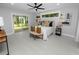 Spacious bedroom with ceiling fan and sliding door access to backyard at 5252 Post Ln, Lakeland, FL 33809