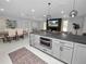 Open concept kitchen with island seating and modern appliances at 5252 Post Ln, Lakeland, FL 33809