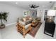 Bright living room featuring comfy seating and a modern coffee table at 5252 Post Ln, Lakeland, FL 33809