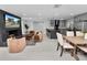 Open living space with modern kitchen, dining area, and living room at 5252 Post Ln, Lakeland, FL 33809