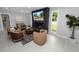 Living room with a modern fireplace and comfortable seating area at 5252 Post Ln, Lakeland, FL 33809