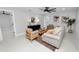 Bright living room with comfy seating and large sliding glass doors at 5252 Post Ln, Lakeland, FL 33809