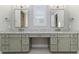 Double vanity bathroom with granite countertop and modern fixtures at 5272 Riverlake Dr, Bartow, FL 33830