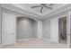Bright bedroom with double doors and neutral wall colors at 5272 Riverlake Dr, Bartow, FL 33830
