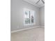 Bedroom with window and plantation shutters at 5272 Riverlake Dr, Bartow, FL 33830