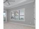 Bedroom with large window and water views at 5272 Riverlake Dr, Bartow, FL 33830