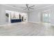 Large living room, open concept, kitchen access at 5272 Riverlake Dr, Bartow, FL 33830