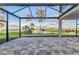 Screened in patio overlooking the water at 5272 Riverlake Dr, Bartow, FL 33830
