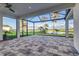 Screened patio with water views and access to backyard at 5272 Riverlake Dr, Bartow, FL 33830