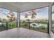 Screened balcony overlooking the lake and conservation at 5272 Riverlake Dr, Bartow, FL 33830
