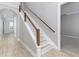 Modern staircase with wood and metal accents at 5272 Riverlake Dr, Bartow, FL 33830
