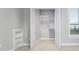 Large walk-in closet with built-in shelving at 5272 Riverlake Dr, Bartow, FL 33830