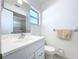Clean bathroom with white vanity and shower at 646 Cottage Ln, Lakeland, FL 33803