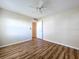 Spacious bedroom with hardwood floors and ceiling fan at 646 Cottage Ln, Lakeland, FL 33803