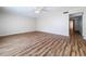 Bright living room featuring hardwood floors and a ceiling fan at 646 Cottage Ln, Lakeland, FL 33803