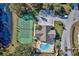 Community features tennis courts, pool, clubhouse, and pond at 6555 Lake Clark Dr, Lakeland, FL 33813