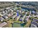 House in a lush green neighborhood, near a pond at 6555 Lake Clark Dr, Lakeland, FL 33813