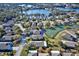 Single-story home near a pond in a residential neighborhood at 6555 Lake Clark Dr, Lakeland, FL 33813