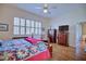 Bedroom with hardwood floors and sliding door access at 6555 Lake Clark Dr, Lakeland, FL 33813