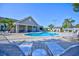 Refreshing pool area with lounge chairs and a spa at 6555 Lake Clark Dr, Lakeland, FL 33813
