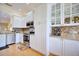 Updated kitchen, featuring stainless steel appliances and granite countertops at 6555 Lake Clark Dr, Lakeland, FL 33813
