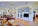 Open concept living room with hardwood floors, built-in shelving and entertainment center at 6555 Lake Clark Dr, Lakeland, FL 33813