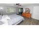 Bright bedroom with a king-size bed and plenty of natural light at 6611 Sweetbriar Ln, Lakeland, FL 33813