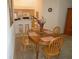 Dining area with wood table and chairs at 6824 Bendelow Dr, Lakeland, FL 33810