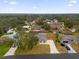 An aerial view showcasing a home's location in a quiet neighborhood at 7738 Merrily Way, Lakeland, FL 33809