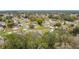 Aerial view of a residential area showcasing the property's surroundings at 812 Del Prado Dr, Kissimmee, FL 34758