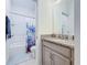Bathroom featuring a tub, shower, and vanity at 812 Del Prado Dr, Kissimmee, FL 34758