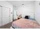 Bedroom with a queen bed and walk-in closet at 812 Del Prado Dr, Kissimmee, FL 34758
