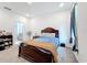 Bright bedroom with double bed and ensuite bathroom access at 812 Del Prado Dr, Kissimmee, FL 34758