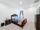 Bedroom with a double bed and dresser at 812 Del Prado Dr, Kissimmee, FL 34758