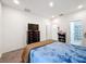 Spacious bedroom with a dresser and ensuite bathroom at 812 Del Prado Dr, Kissimmee, FL 34758