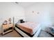Bedroom with a queen bed and nightstand at 812 Del Prado Dr, Kissimmee, FL 34758