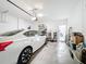 Attached garage with car and additional storage at 812 Del Prado Dr, Kissimmee, FL 34758