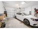 Garage with space for one car and storage shelves at 812 Del Prado Dr, Kissimmee, FL 34758