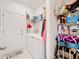 Convenient laundry room with washer, dryer and storage at 812 Del Prado Dr, Kissimmee, FL 34758