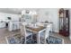 Charming dining room featuring a wood table and stylish rug at 1039 Motorcoach Dr, Polk City, FL 33868