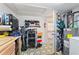 Well-organized workshop with ample storage and workbenches at 1039 Motorcoach Dr, Polk City, FL 33868