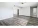 Spacious living room featuring wood-look floors and neutral walls at 1130 N Lake Parker Ave # A302, Lakeland, FL 33805