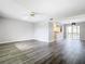 Bright living room with gray walls and wood-look floors at 1130 N Lake Parker Ave # A302, Lakeland, FL 33805