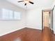 Spacious bedroom featuring wood floors and an adjacent closet at 1130 N Lake Parker Ave # A306, Lakeland, FL 33805