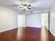 Spacious bedroom with hardwood floors and ceiling fan at 1130 N Lake Parker Ave # A306, Lakeland, FL 33805