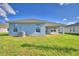 Single story home with large backyard and covered patio at 1214 Tagliamento Ln, Haines City, FL 33844