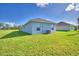 Single story home with large backyard and AC unit at 1214 Tagliamento Ln, Haines City, FL 33844