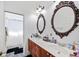 Elegant bathroom with double vanity and a shower at 1217 Vista Hills Dr, Lakeland, FL 33813